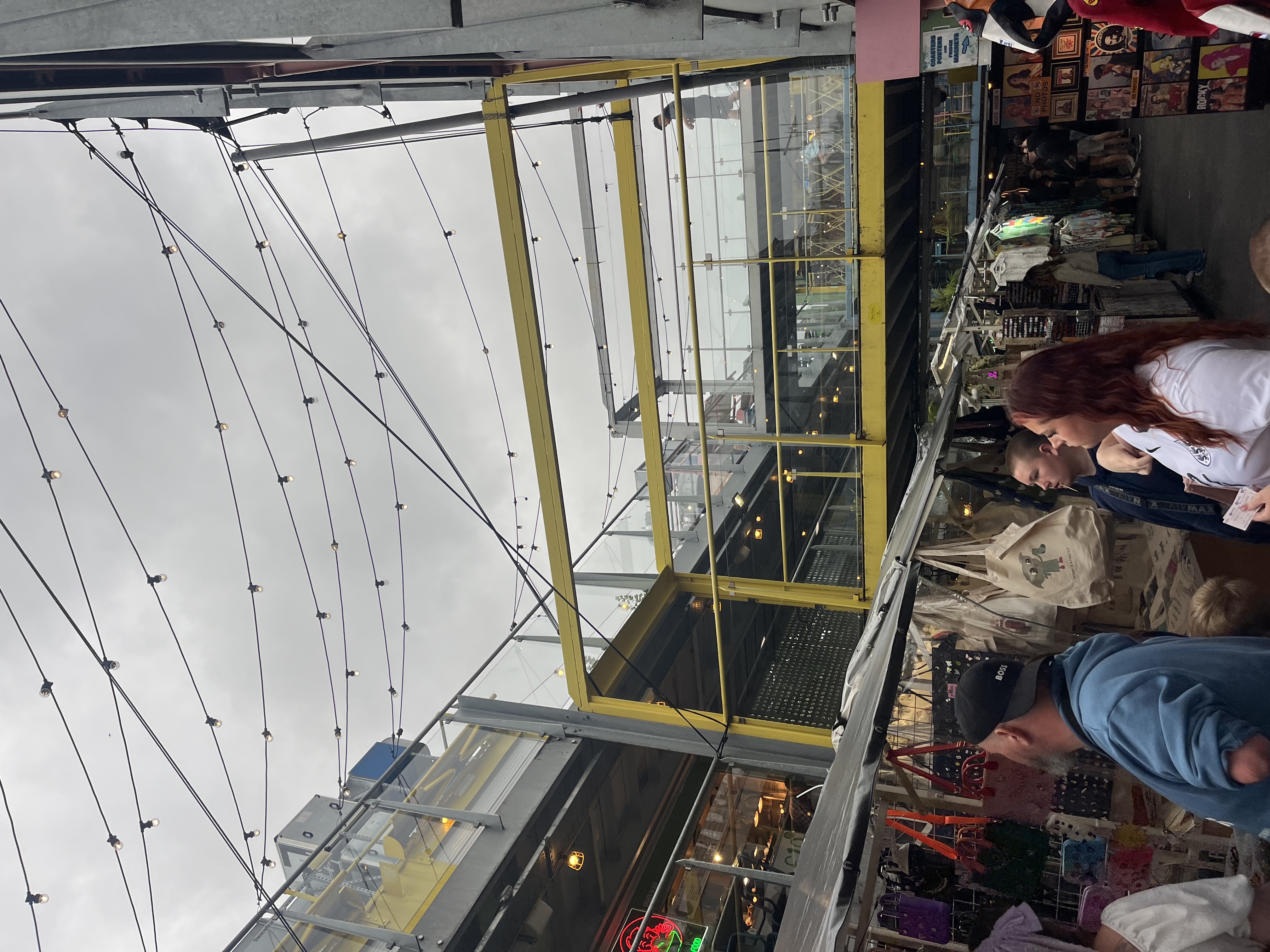 Busy London market with elevated walkway